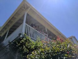 Beautiful ladies peer down from the porch of Arrowood Winery in Sonoma Valley