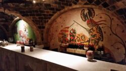 A mural graces the wine bar at Castello di Amorosa in Calistoga California.