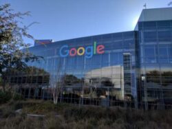 The Google Offices sport their primary colors for a curious tour group.