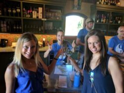 Three women enjoy Hagafen Winery in Stags Leap in Napa valley.