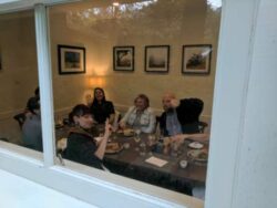 The guests celebrate at the Grill at Meadowood in a private room.