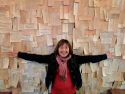 Noi of Master Wine Tours spreads her wings on the wall of Basalt Restaurant, Napa, California.